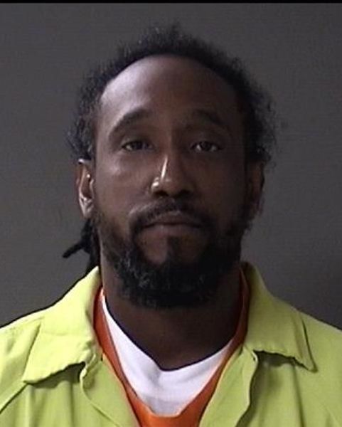 Booking photo of Andre Brown