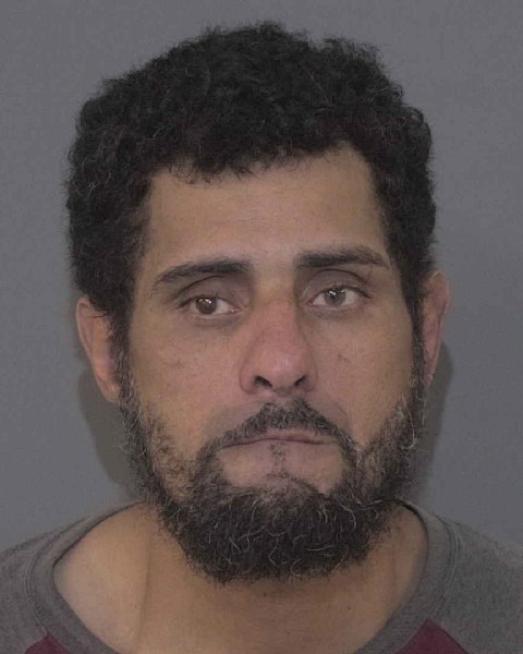 Booking photo of Ody Peralta