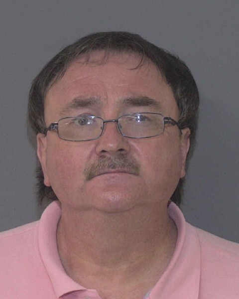 Booking photo of Russell Adcock