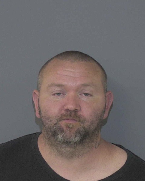 Booking photo of Tony Sims