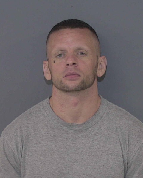 Booking photo of Roger Burns