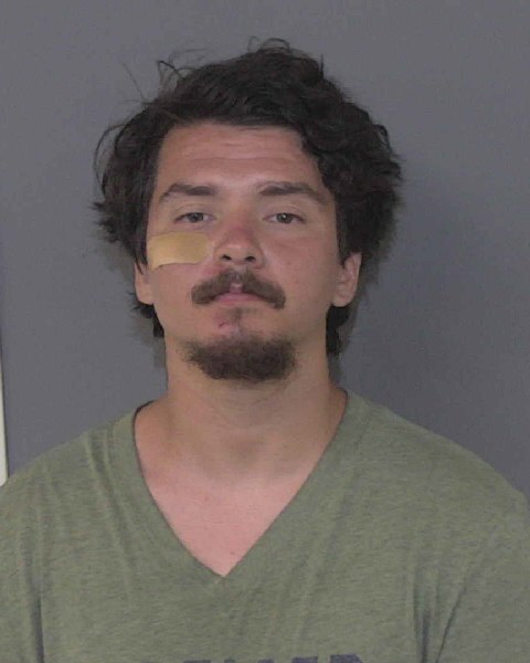 Booking photo of Michael Melchor-arant
