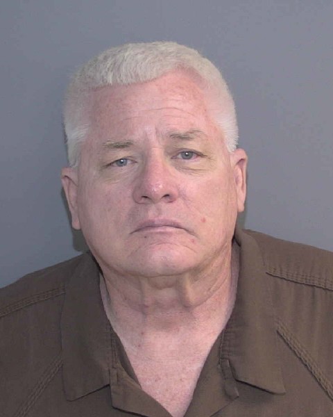 Booking photo of John Cooper