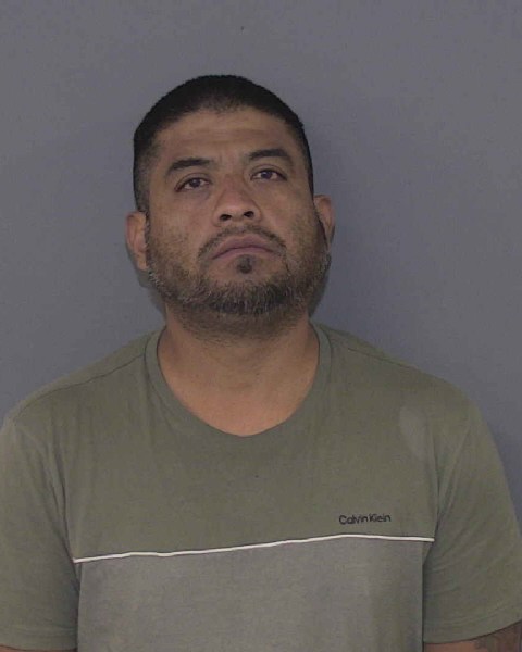 Booking photo of Moises Flores Hernandez