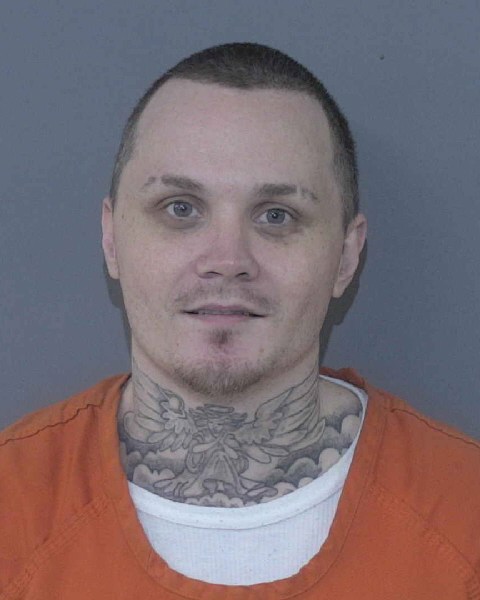 Booking photo of Christopher Redmon