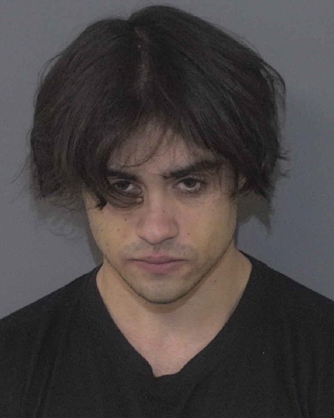 Booking photo of Raymond Torres