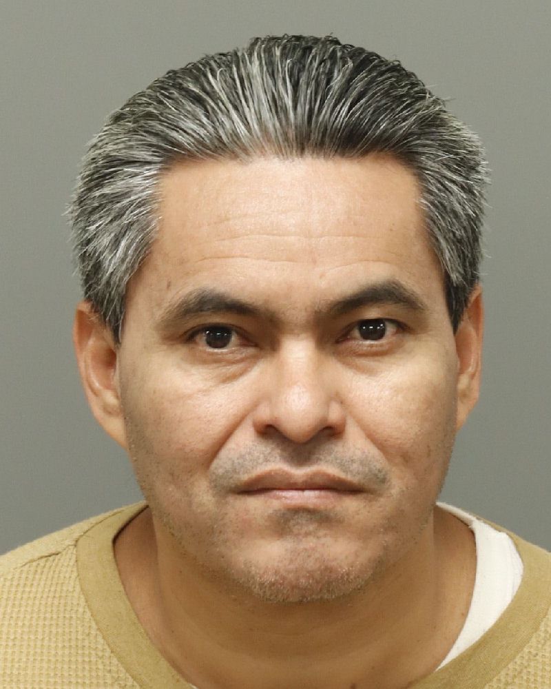 Booking photo of Hessman Giron-osorto