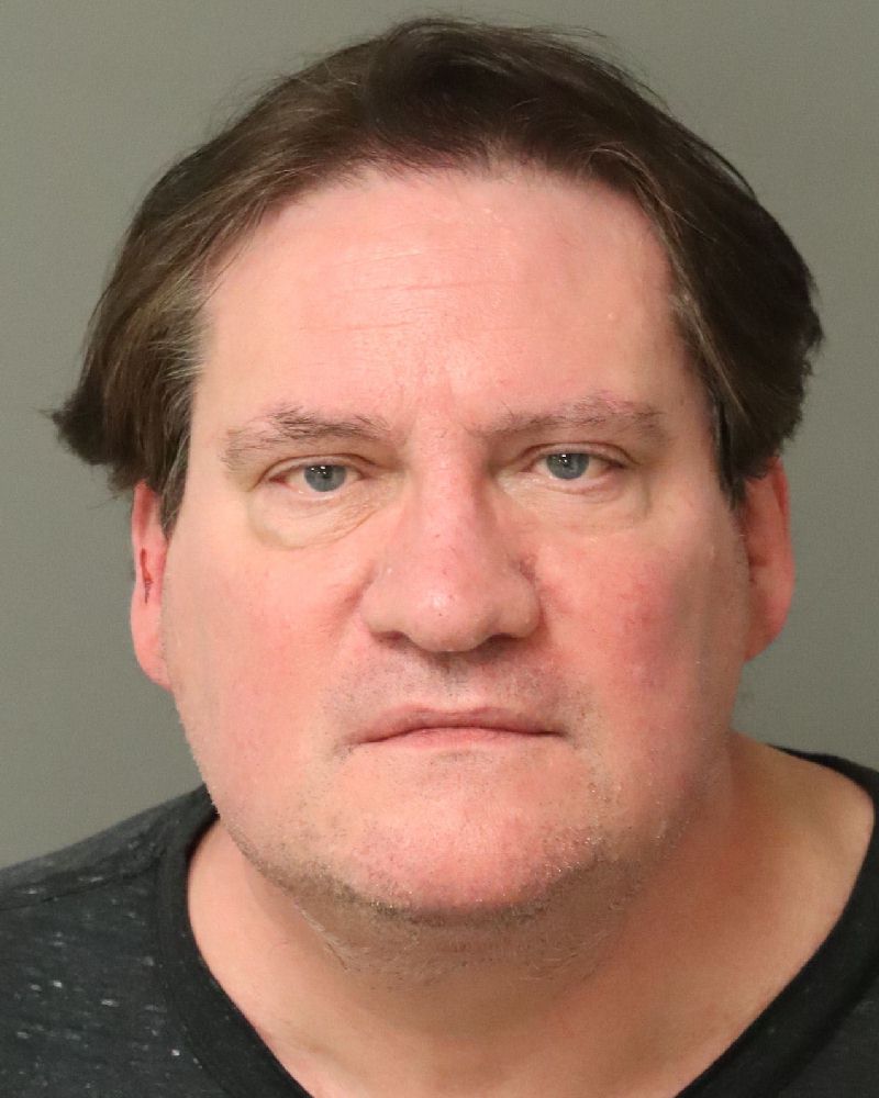 Booking photo of Russell Koster