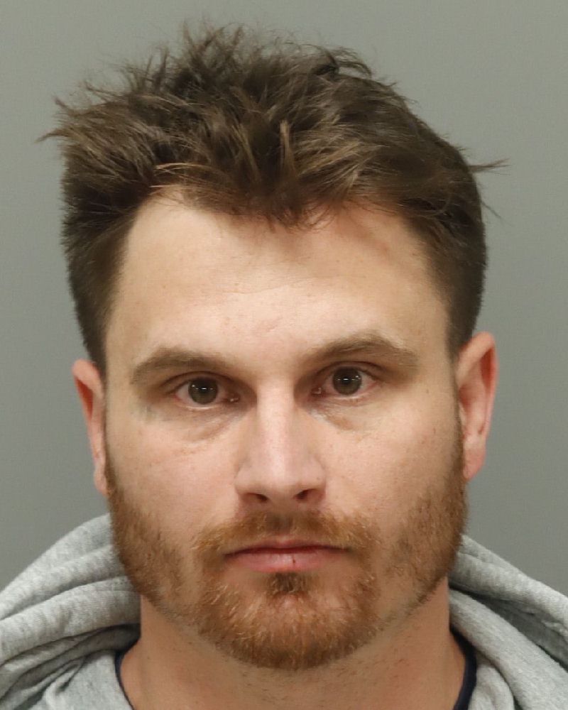 Christian Dougan booking photo