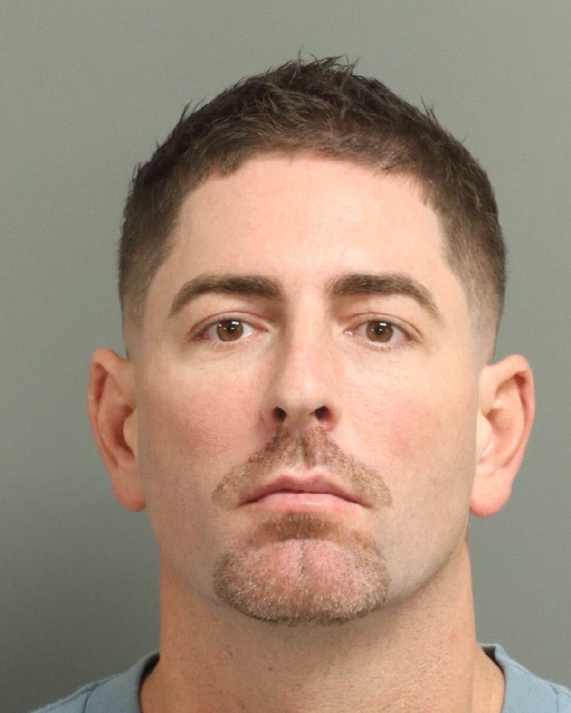 Booking photo of Christopher Mayes