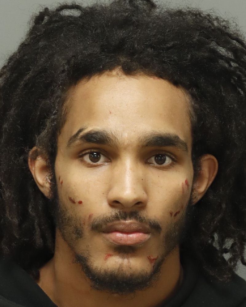 Booking photo of Djego Mueller