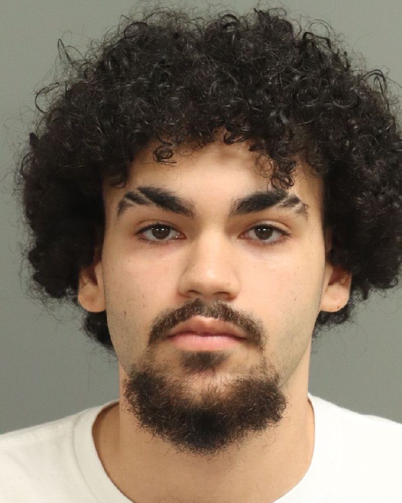 Booking photo of Axel Ortega-gaton