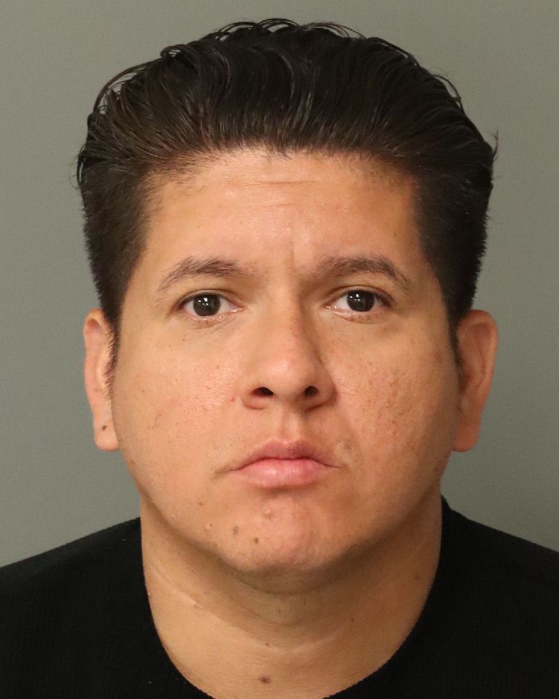 Booking photo of Sergio De Leon