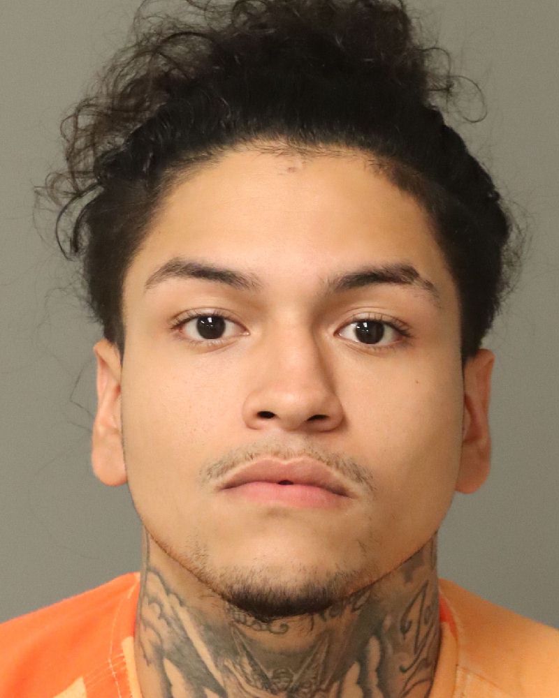 Booking photo of Denis Machigua