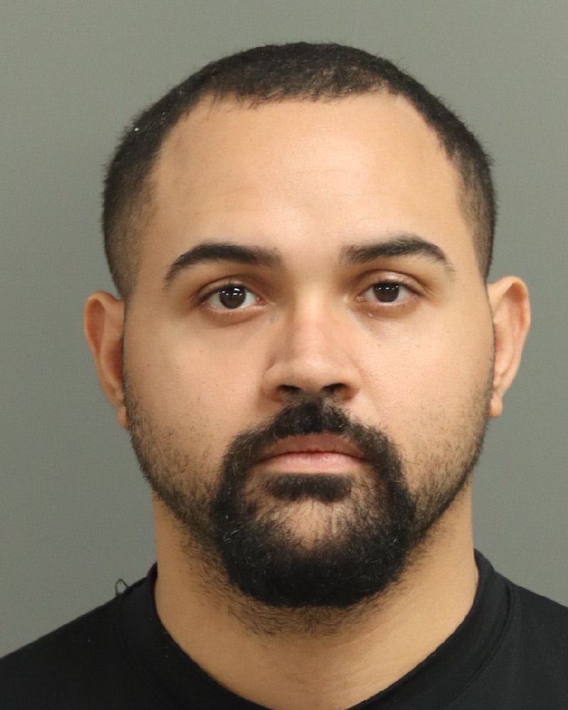 Booking photo of Michael Muniz