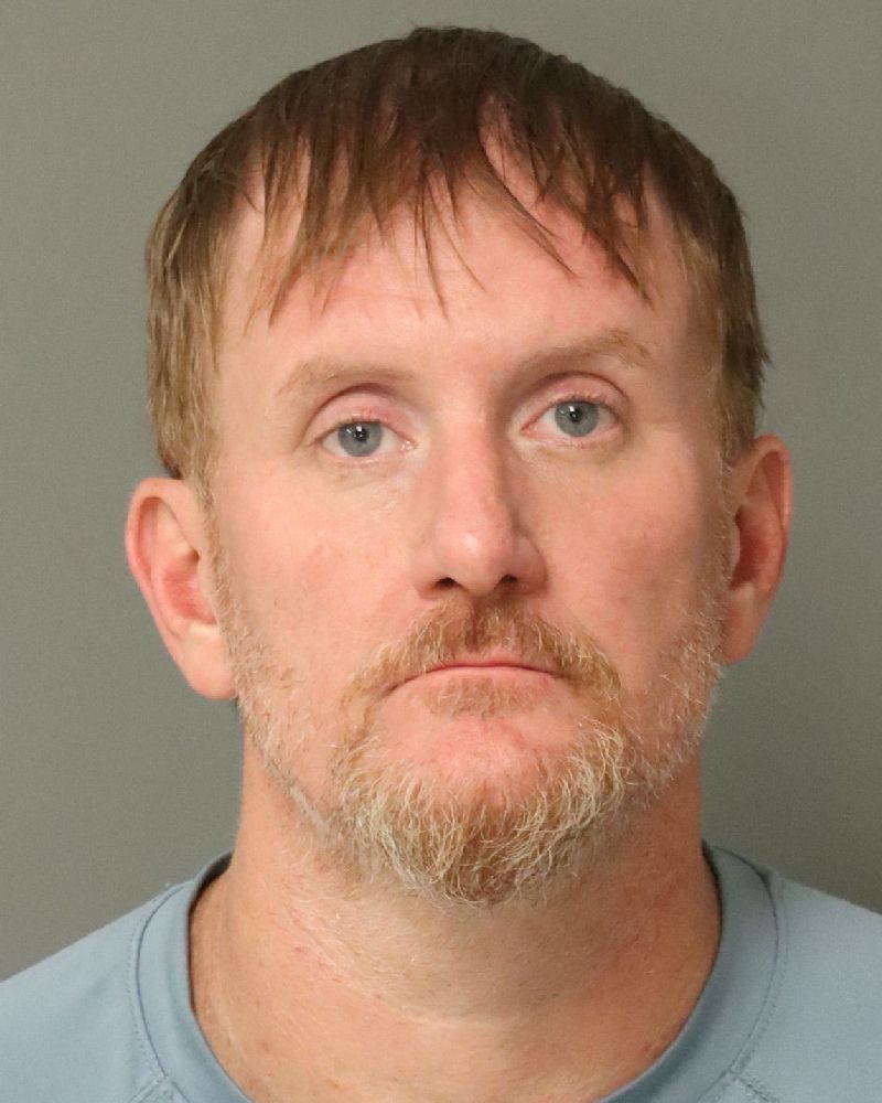 Booking photo of Scotty Dew