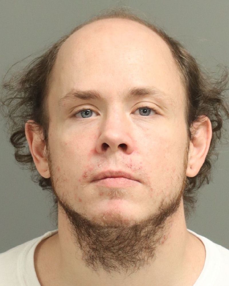 Booking photo of Christian Thompson