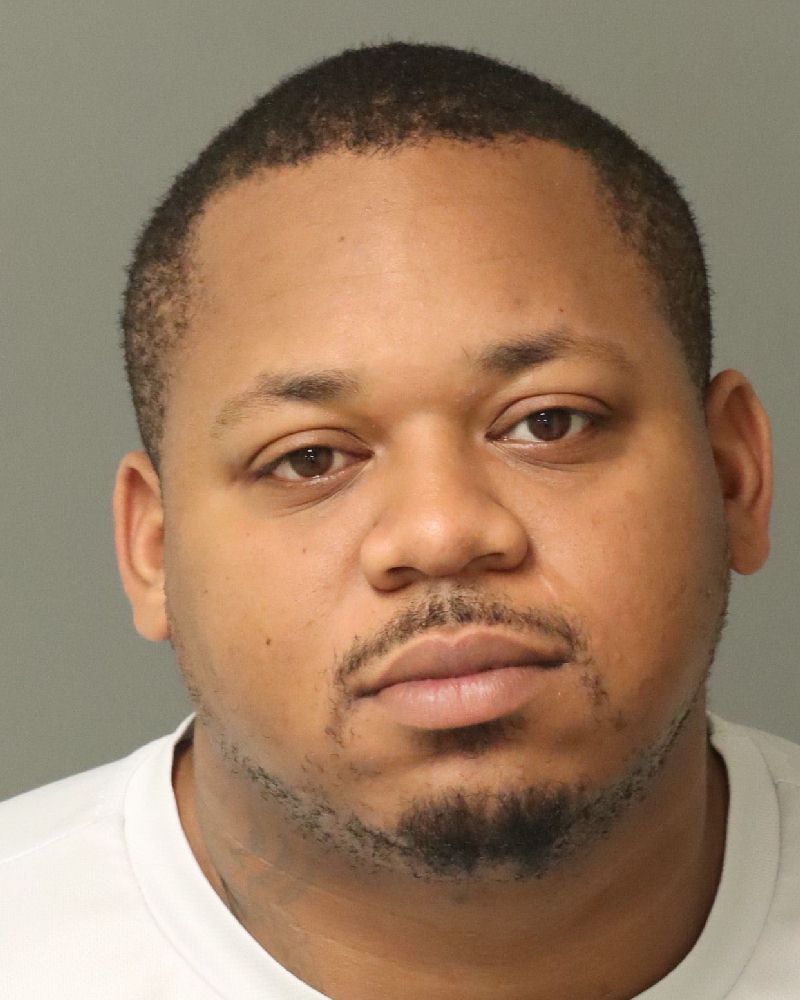 Booking photo of Rasheen Moore