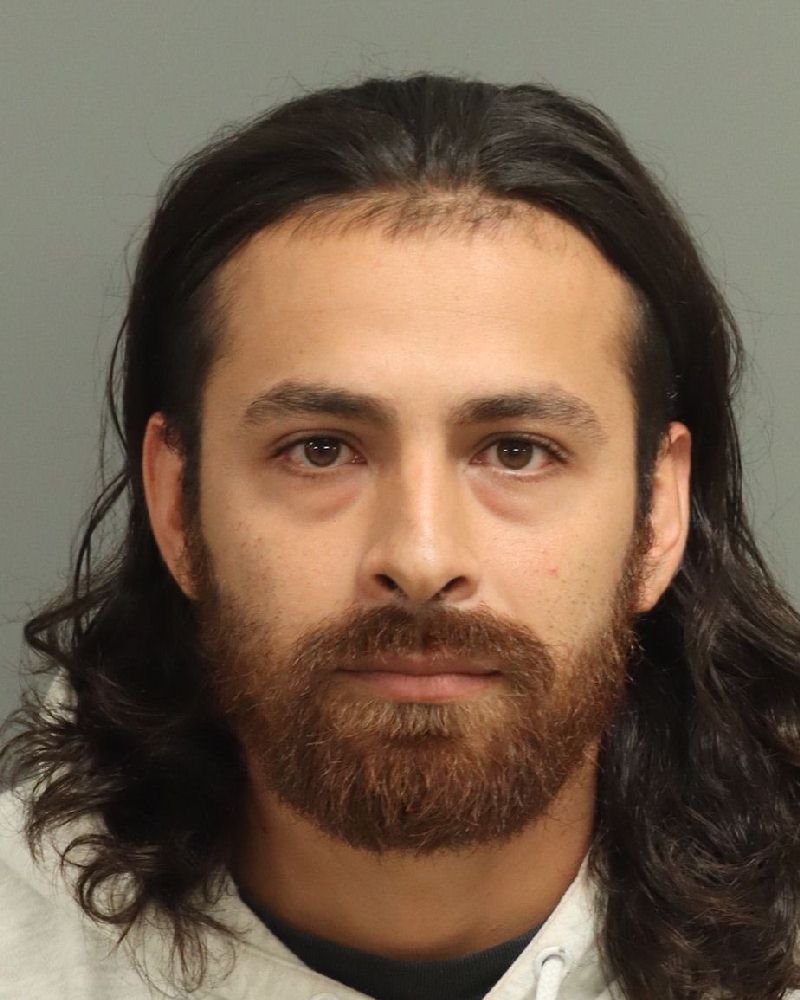 Booking photo of Chris Benitez