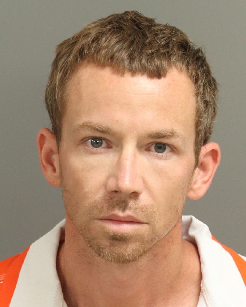 Booking photo of Christopher Brock