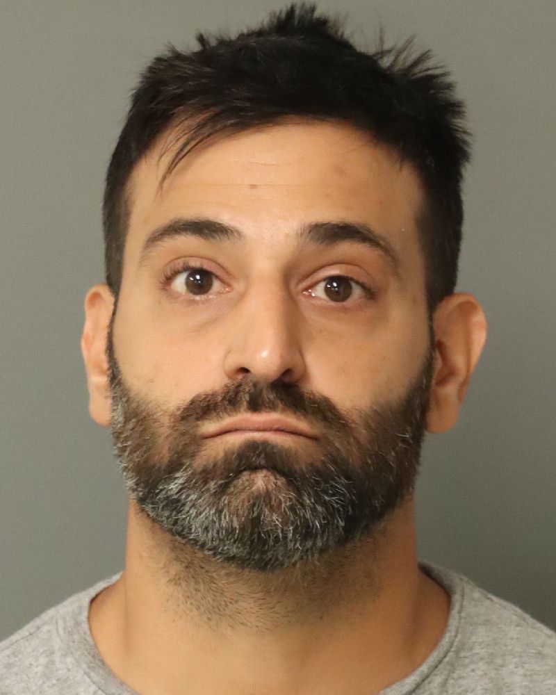 Booking photo of Ioannis Kakouras