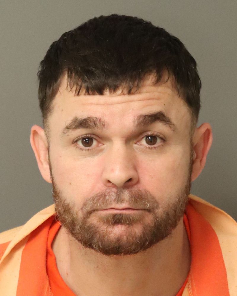 Booking photo of Christopher Dockum