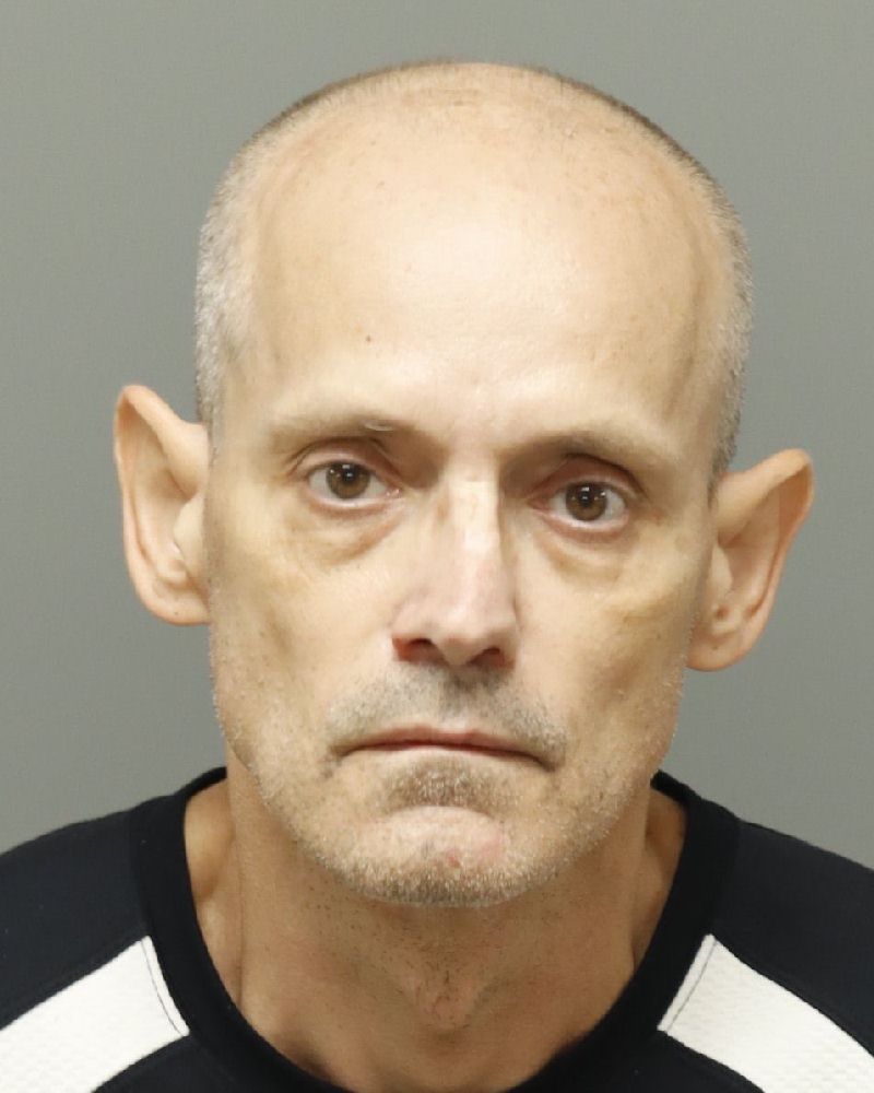 Derek Cholon booking photo