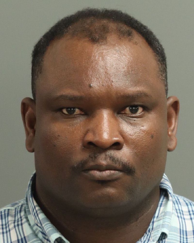 Booking photo of Paul Yongo-odindo