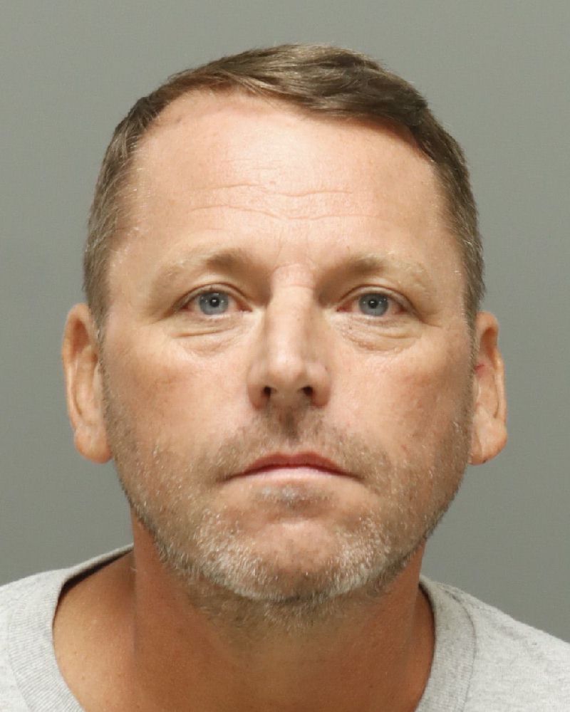 Booking photo of Michael Hughes