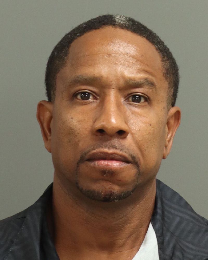 Booking photo of Andre Mcneill