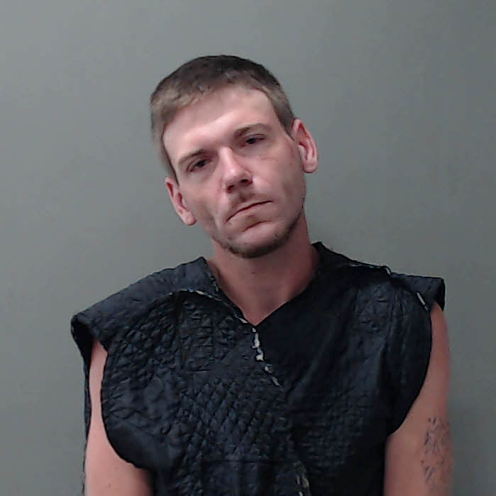 Booking photo of Jhustin Todd Cates