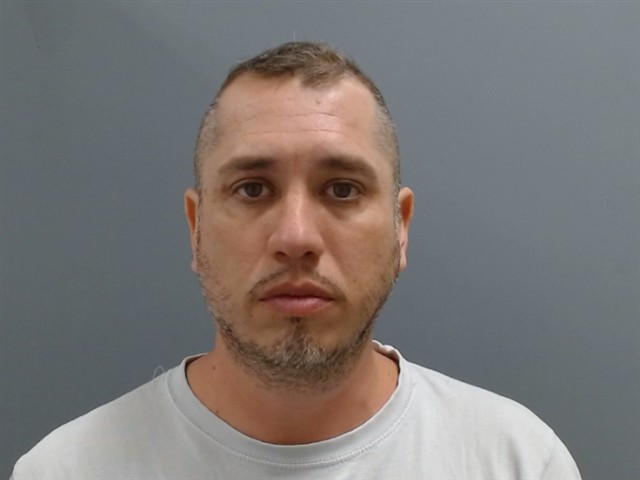 Booking photo of Erick Guzman