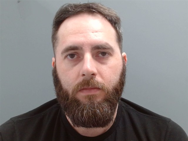 Booking photo of Johnathan Thomas