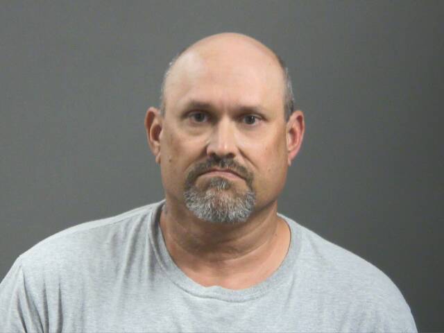 Booking photo of Ronald Suarez