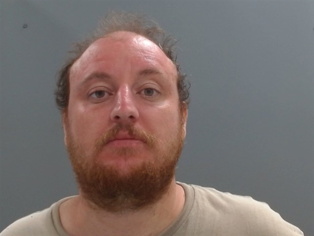 Booking photo of Joseph Rotuna