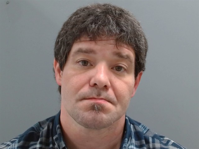 Booking photo of Travis Hudler