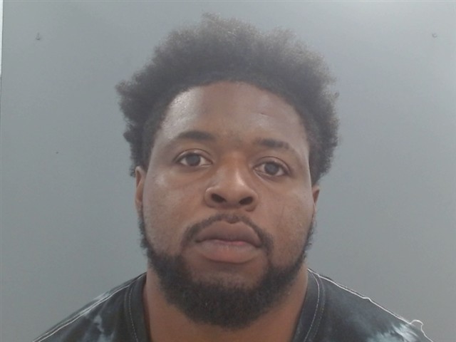 Booking photo of Alex Brooks