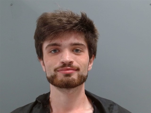 Booking photo of Miles Adams