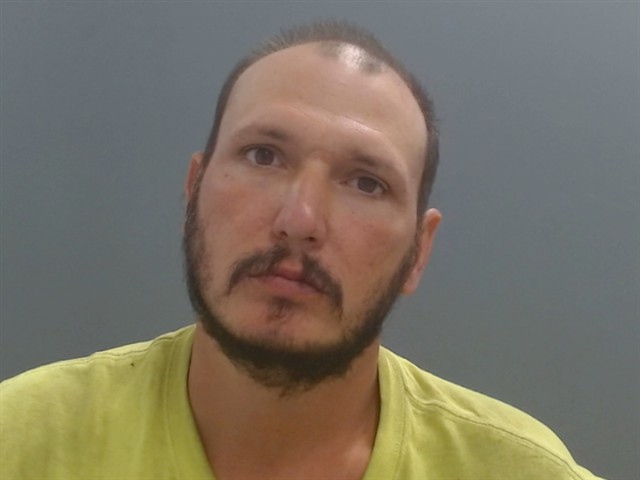 Booking photo of Bradley Reeves
