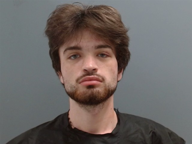 Booking photo of Miles Adams