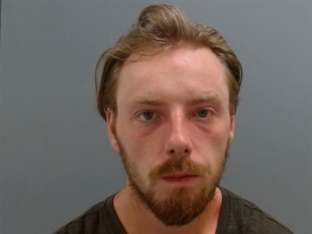 Booking photo of Cayman Nelson