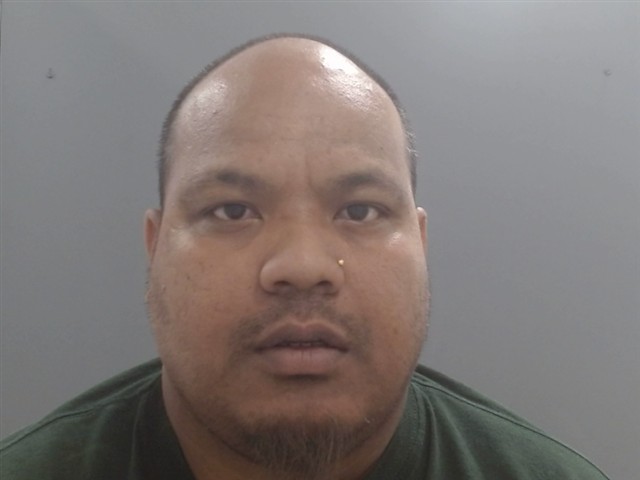Booking photo of Winson Telan