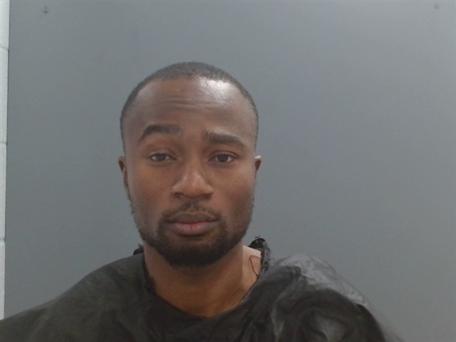 Booking photo of Huthman Bisiolu-king