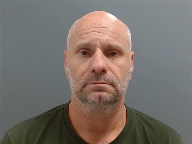 Booking photo of David Peckham
