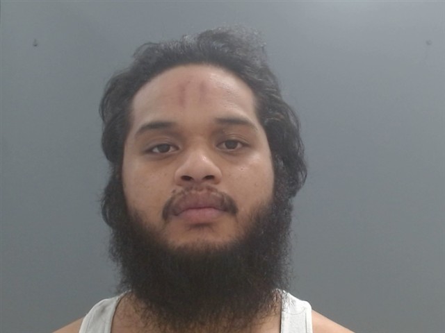 Booking photo of Isaac Aneo