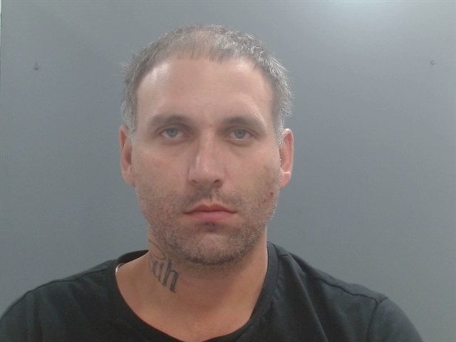 Booking photo of Sergio Urquidi