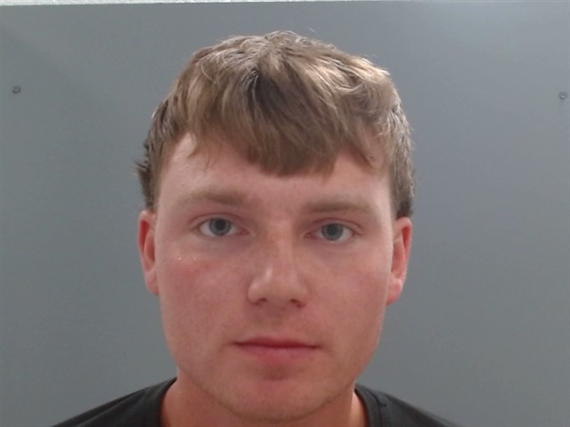 Booking photo of John Wilson