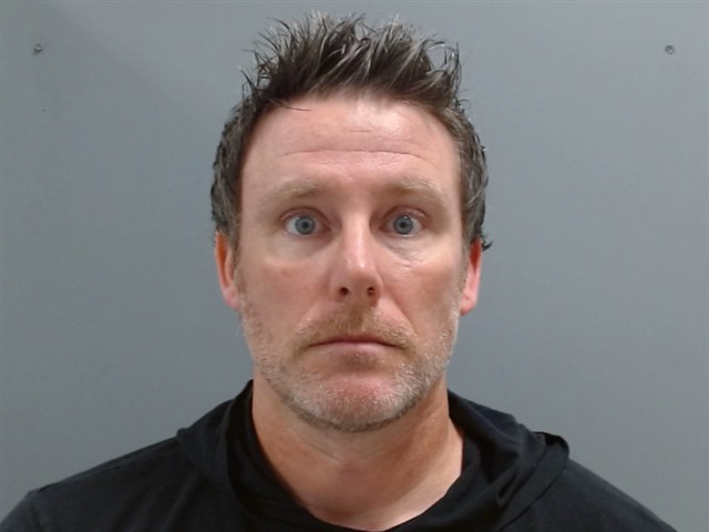 Booking photo of Kyle Roach