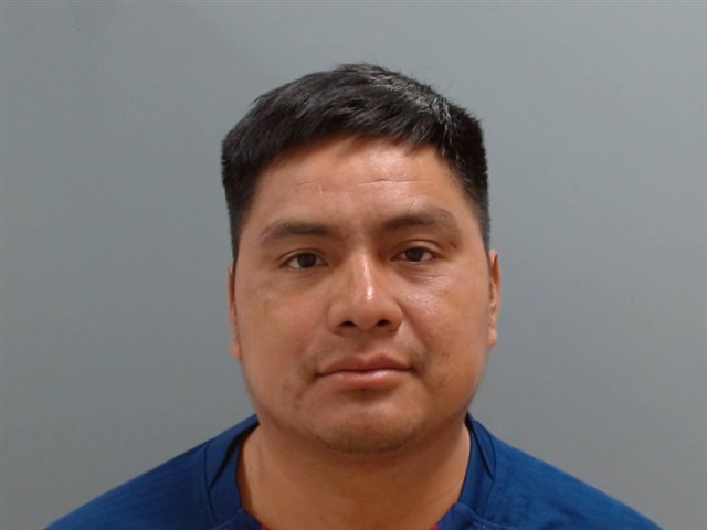 Booking photo of Che Sales Domingo Oswaldo