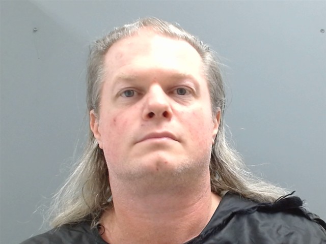 Booking photo of Christopher Hill